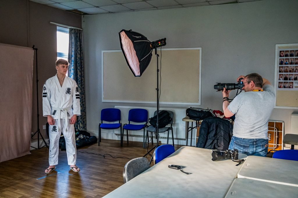 Photograph of a person having their portrait taken
